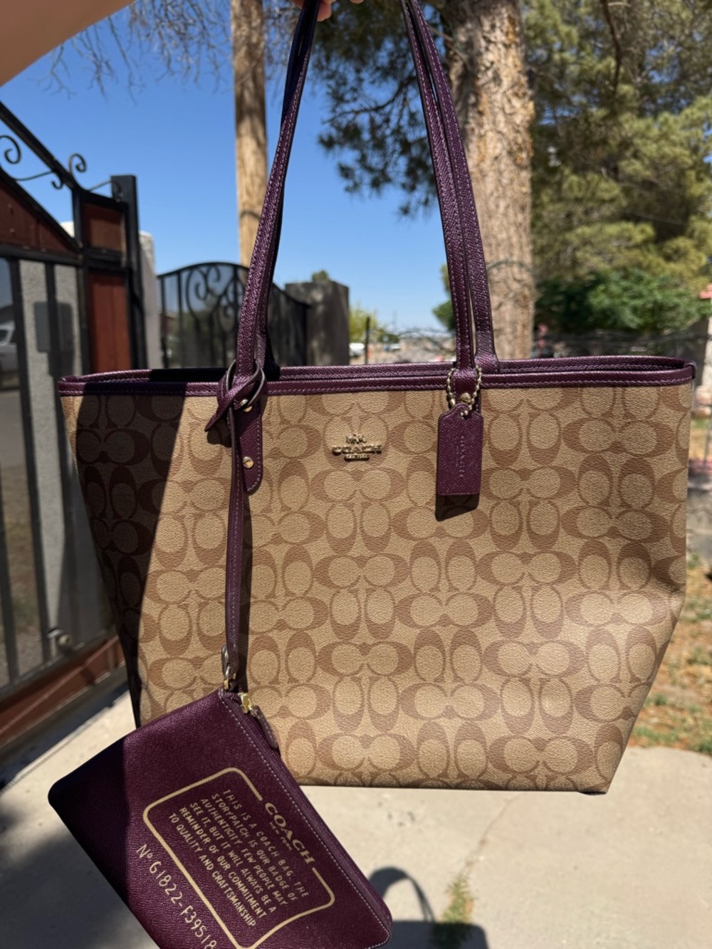 Coach Brown Signature Canvas Tote with Purple Leather Trim